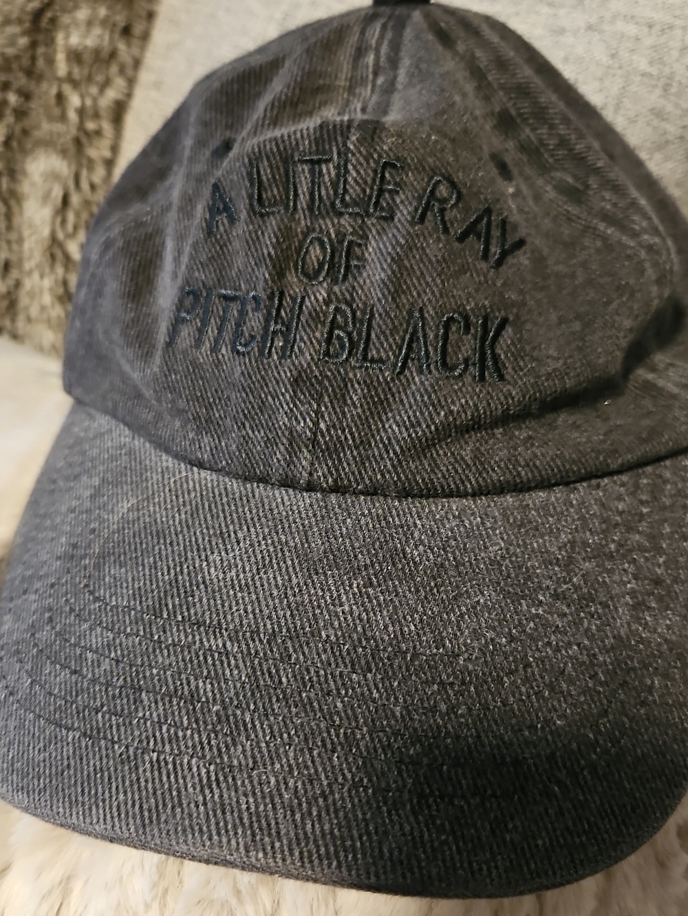 "A Little Ray Of Pitch Black" Embroidered Baseball Cap